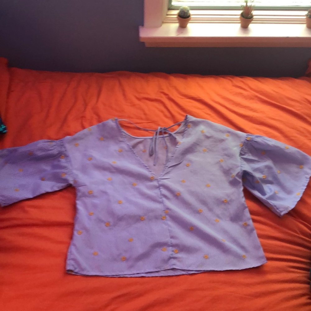 Blue and white top with yellow flowers
